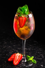 Cocktail with strawberries and mint