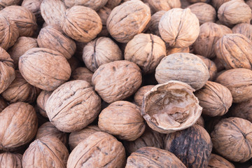 whole walnuts with a shell on top