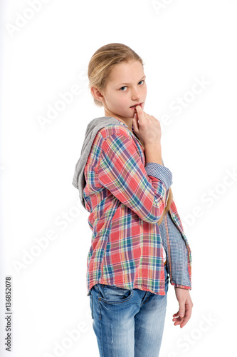 Portrait Of Young Cute Shy Teenage Girl On White Backg
