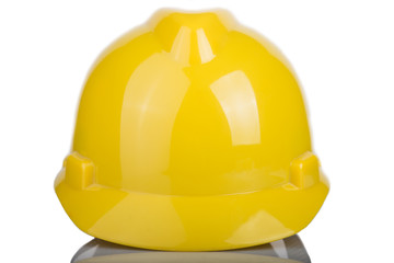 Fototapeta premium Yellow hardhat safety helmet on white background