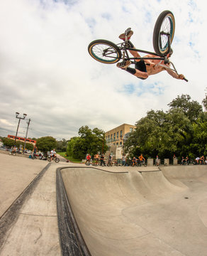 Man performing stunt on bike at skate park, Austin, Texas, United States of America 