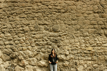stylish happy woman with analog film camera  on background of ci