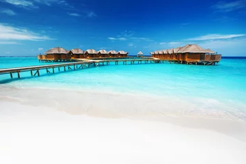 Gordijnen Water bungalows resort at islands. Indian Ocean, Maldives © Ivan Kurmyshov
