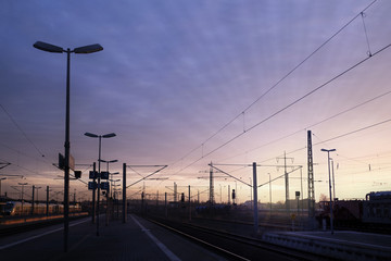 Fototapeta na wymiar Railway Platform at Sunset, Looking out over the tracks, Bitterfeld, Germany
