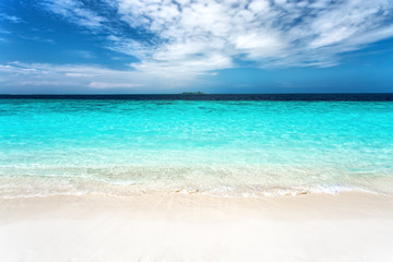 Fototapeta na wymiar Soft wave at tropical sand beach island, Maldives