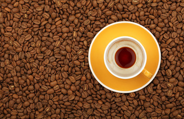 Empty black coffee yellow cup and saucer on beans