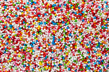 Multicoloured sweet sugar balls. Small ball pattern.