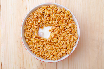 Wheat cereals in milk or other milk product with honey. Healthy