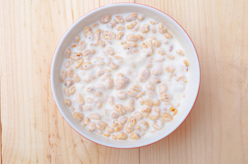 Wheat cereals in milk or other milk product with honey. Healthy