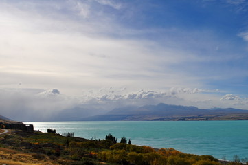 Mount Cook viewpoint with the lake Pukaki and road leading to mount cook village