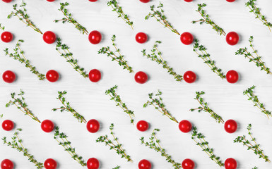 Background of cherry tomatoes and thyme, seamless texture patter