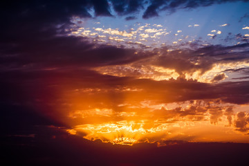 Beautiful colorful sunset and clouds. Sun rays