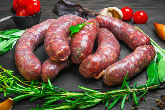 Raw uncooked meat sausages