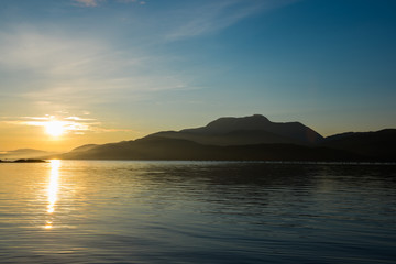 Fototapeta premium Sunrise over lake in Scotland