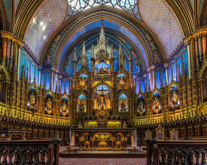 Fototapeta na wymiar The spectacular architecture, design and details of Notre Dame Basilica in Montreal city, Quebec, Canada
