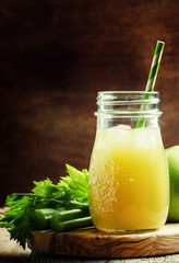 Freshly squeezed juice with celery, green apple and ice. Vintage