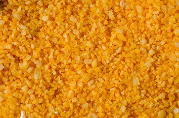 Yellow sea salt close-up background