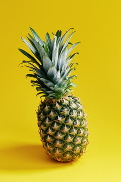 Pineapple On Yellow Background