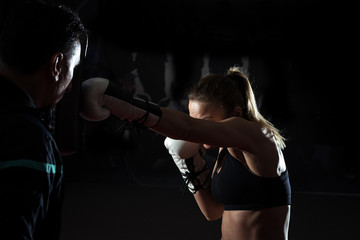 Fototapeta na wymiar Kickboxing female training