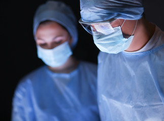 Team surgeon at work in operating room