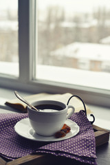 Cup of coffee on vintage tray