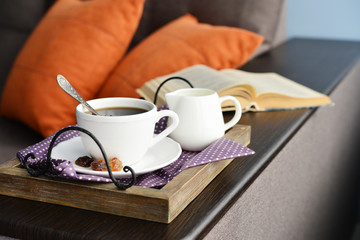 Cup of coffee on vintage tray