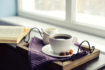 Cup of coffee on vintage tray