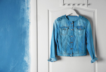 Female clothes hanging on door