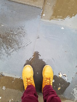 Myself standing in a pudle in London after a rainy day