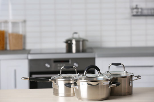 Metal pans on kitchen counter