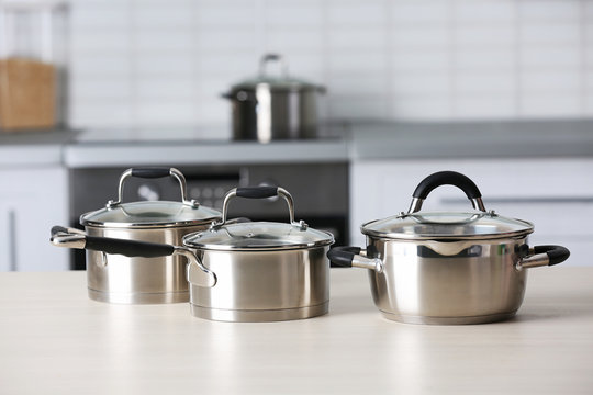 Metal pans on kitchen counter