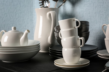 Set of simple dinnerware on black table
