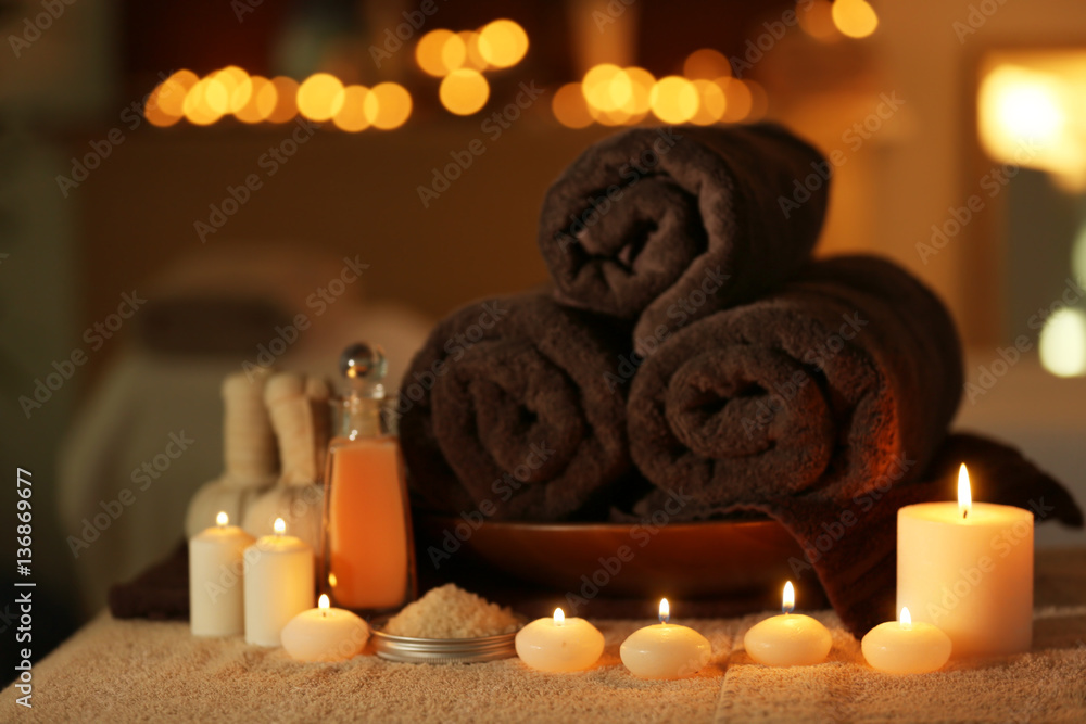 Wall mural natural treatments and alight candles in spa salon