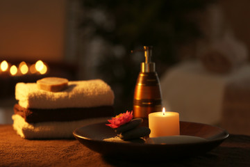 Natural treatments and alight candles in spa salon