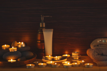 Natural treatments and alight candles in spa salon
