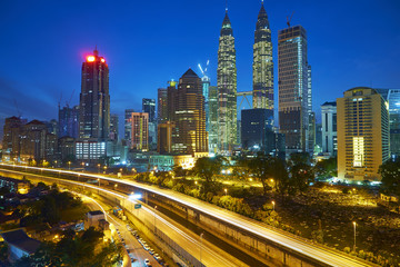 Fototapeta na wymiar Kuala Lumpur city skyline at night, Malaysia .