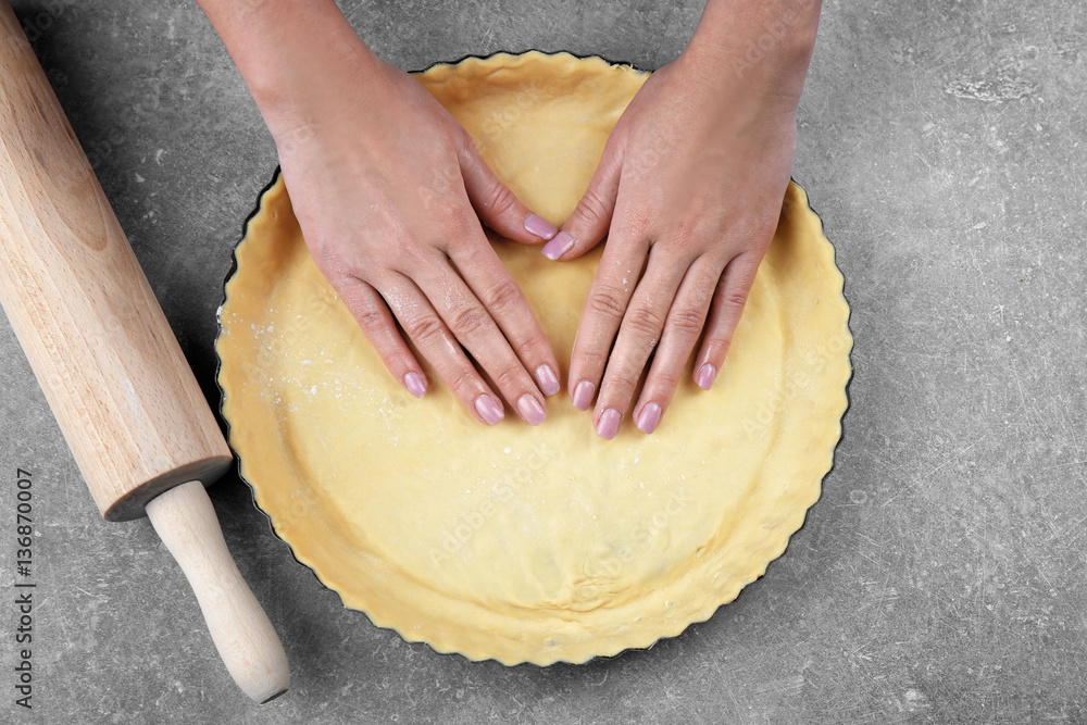 Canvas Prints woman preparing cake on kitchen table