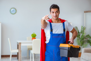Super hero repairman working at home