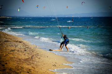 Kitesurfers on the Milos beach in Lefkada.