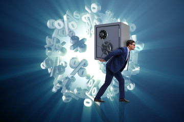 BUsinessman stealing metal safe from bank