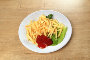 fries potatoes with sauce on a white plate