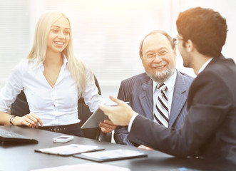 the business team works with the financial