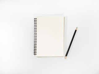 Top view open notebook and pencil potted on white background.