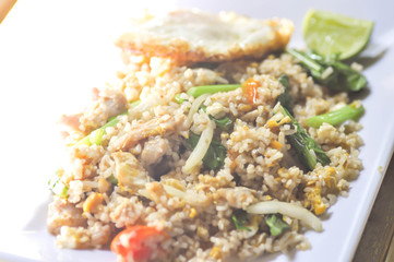 stir-fried rice or fried rice with fried egg and cucumber