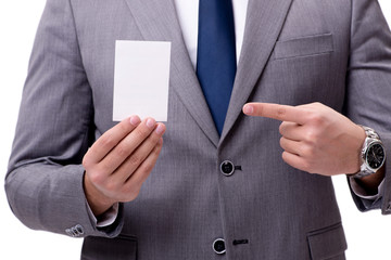 Businessman with blank card isolated on white background
