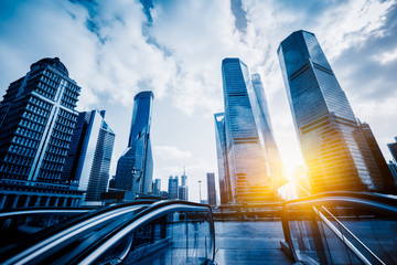 Escalator with cityscape in background of China.