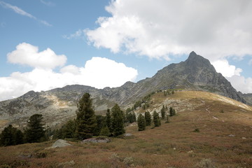A mountain range in the natural Park Ergaki The view on top with the title 