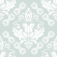 Seamless damask pattern. Traditional classic orient ornament. Light blue and white pattern