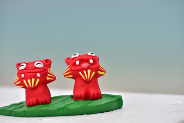 シーサーとビーチ