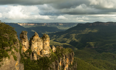 Famous Three Sisters at Sunset  in the Blue Mountains, Australia. Image taken on a cloudy day during sunset.